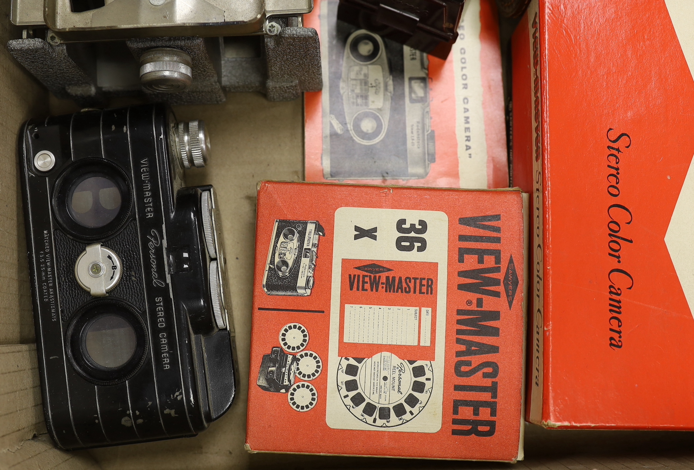 A View-Master Personal stereo camera and a View-Master Mark II stereo camera with Rodenstock lens, leather case, instructions and box, together with a film cutter